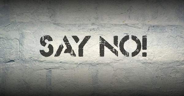 Say No! Graffiti auf einer Wand, bekannter Ausdruck für klare Absage oder Widerstandrompt.